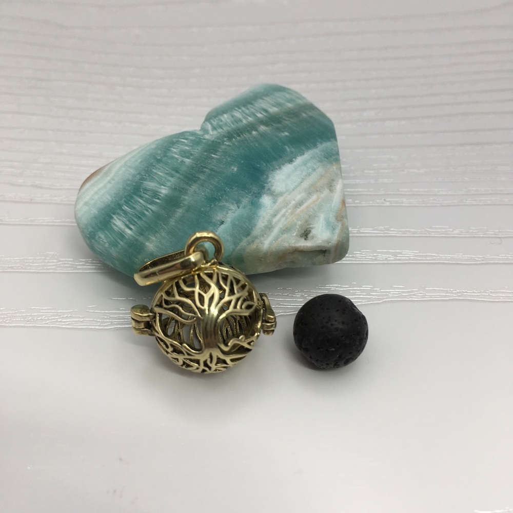 Double Tree of Life Aromatherapy Brass tone Locket.  Lava stone included.
